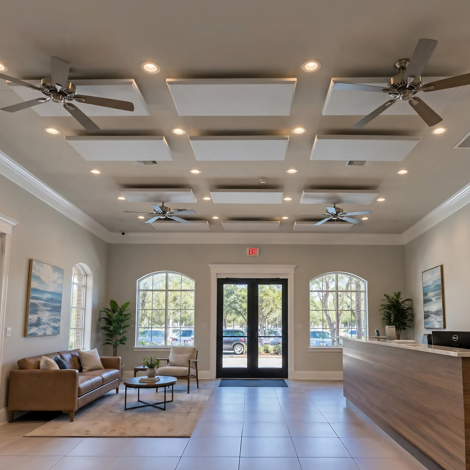 Acoustic ceiling panels in Dim off-white mounted flat across a white lobby ceiling between recessed lights and ceiling fans