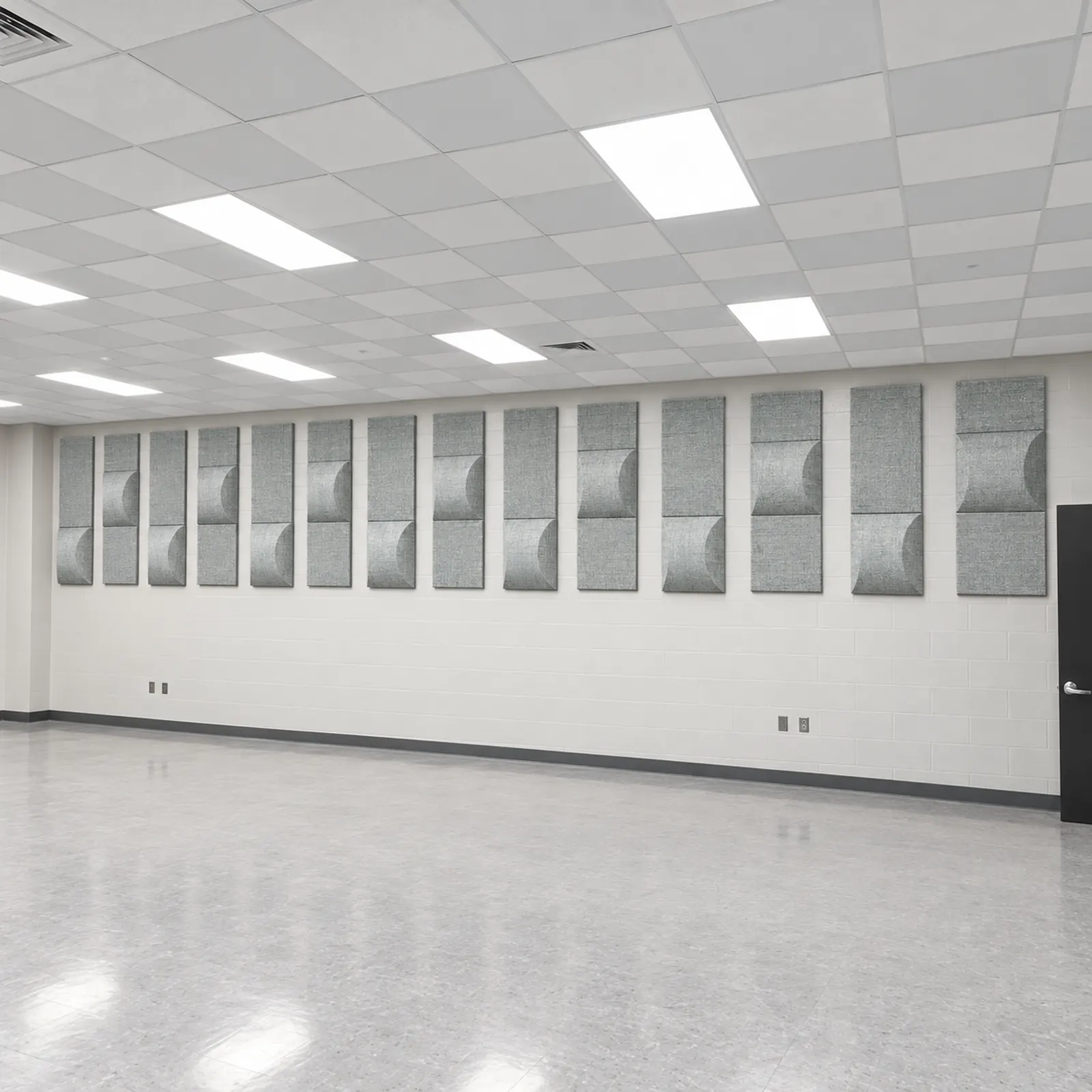 Classroom wall lined with a row of Verte Papier FR701 barrel diffusers
