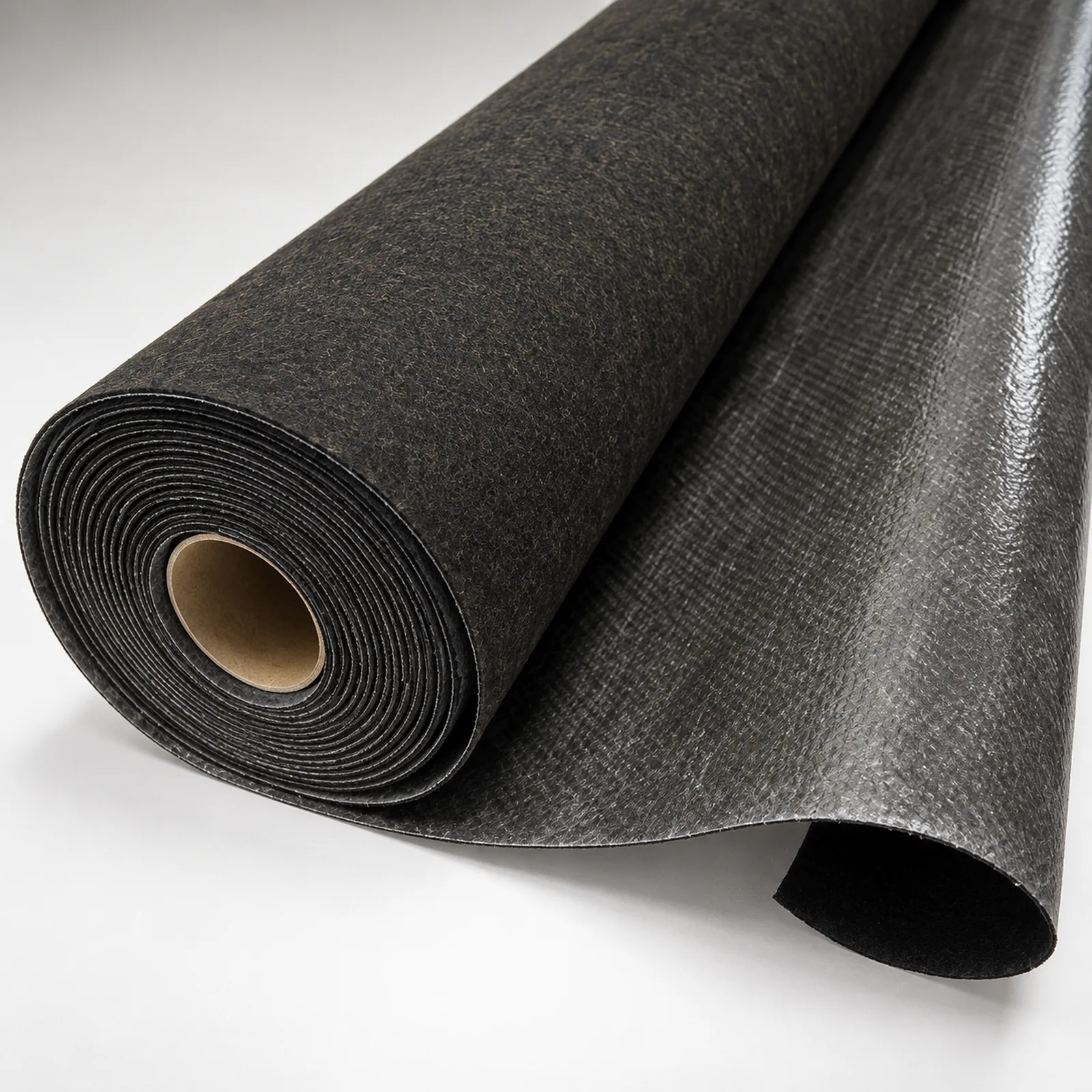 Floor Blokker Lite felt underlayment unrolled to show the felt side and the moisture-blocking vapor barrier film